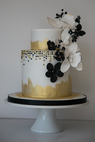 white ranunculus cake